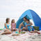 A barraca de pouco peso UPF 50+ da proteção solar da praia automática estala acima para 2-3 pessoas